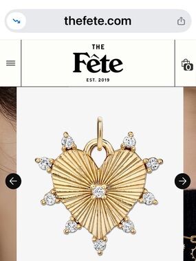 The Fête Gold  vermeil Heart Burst Pendant with diamonds.